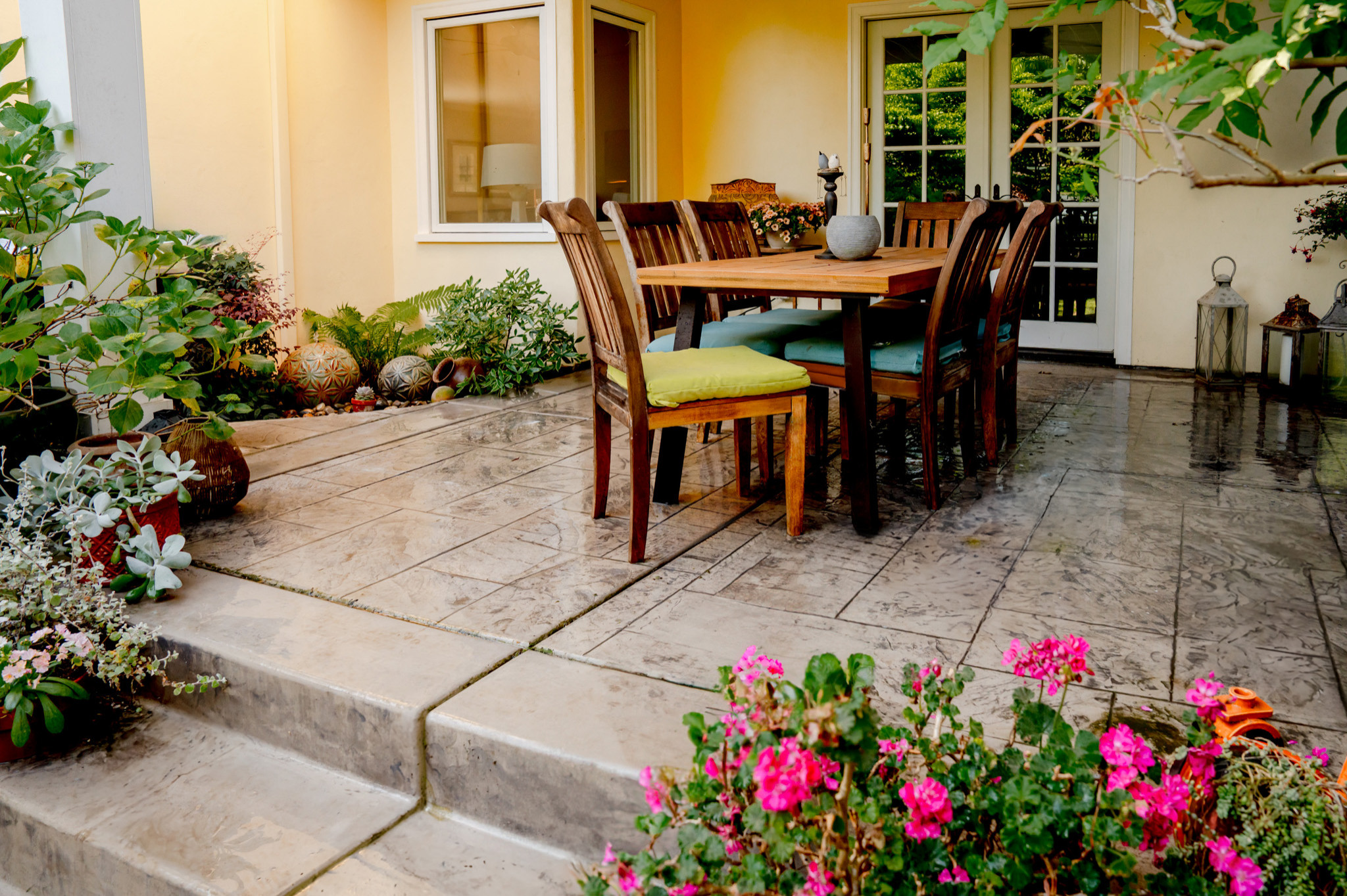 Dining Table with Garden View and French Door Backdrop