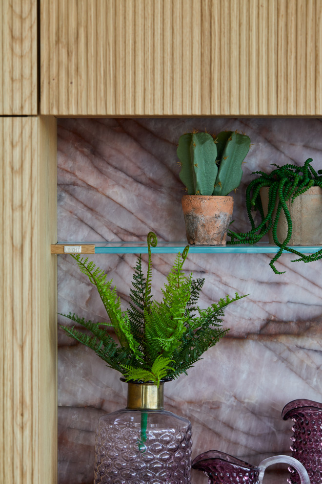 Inspiration for a large contemporary single-wall open plan kitchen in London with an island.