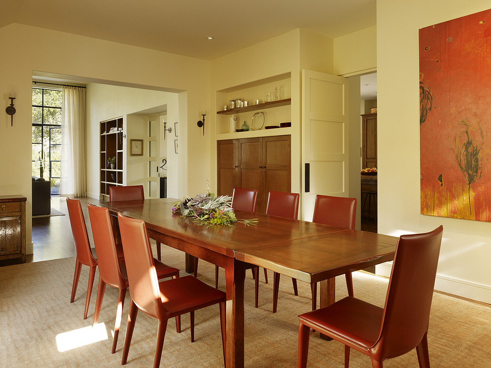 Photo of a transitional separate dining room in San Francisco with beige walls.