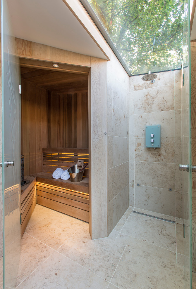 Design ideas for a contemporary bathroom in London with beige tile and with a sauna.
