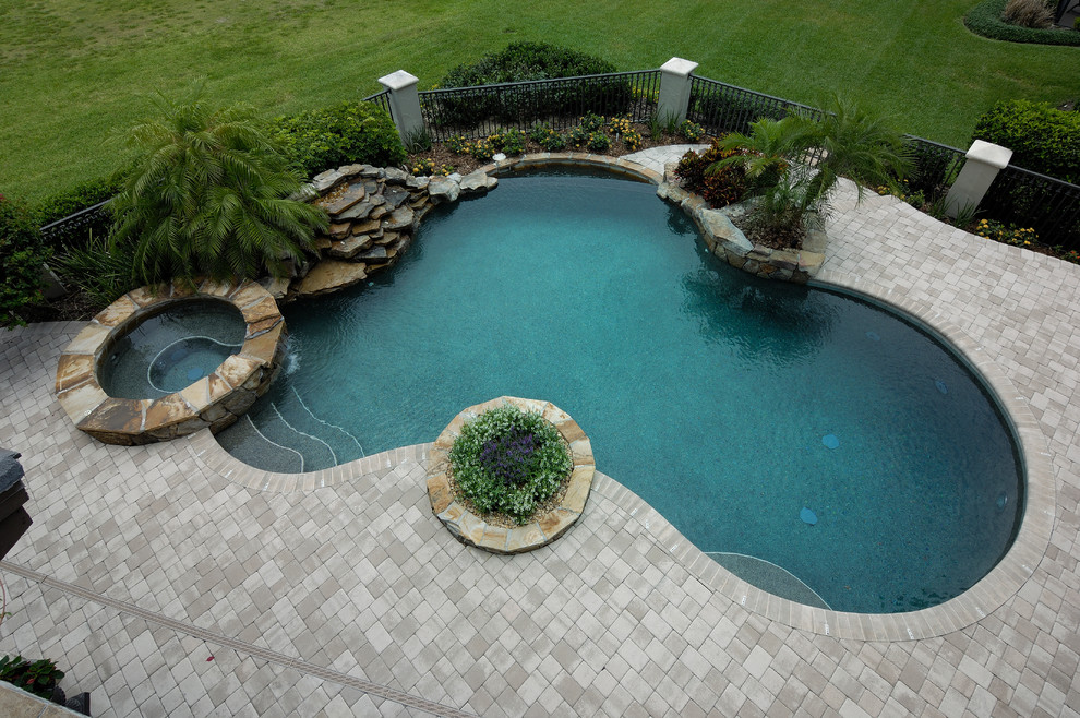 Inspiration for a large mediterranean pool in Tampa.