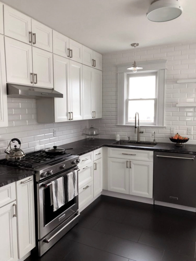 Example of a transitional kitchen design in New York