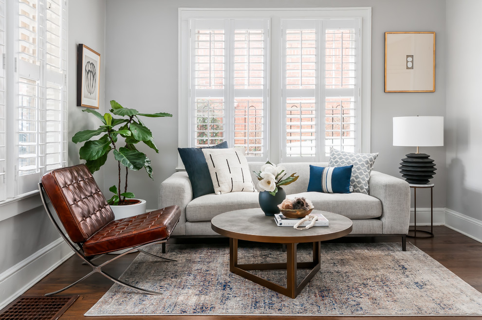 Inspiration for a mid-sized scandinavian open concept dark wood floor and brown floor living room remodel in Atlanta with no fireplace and gray walls