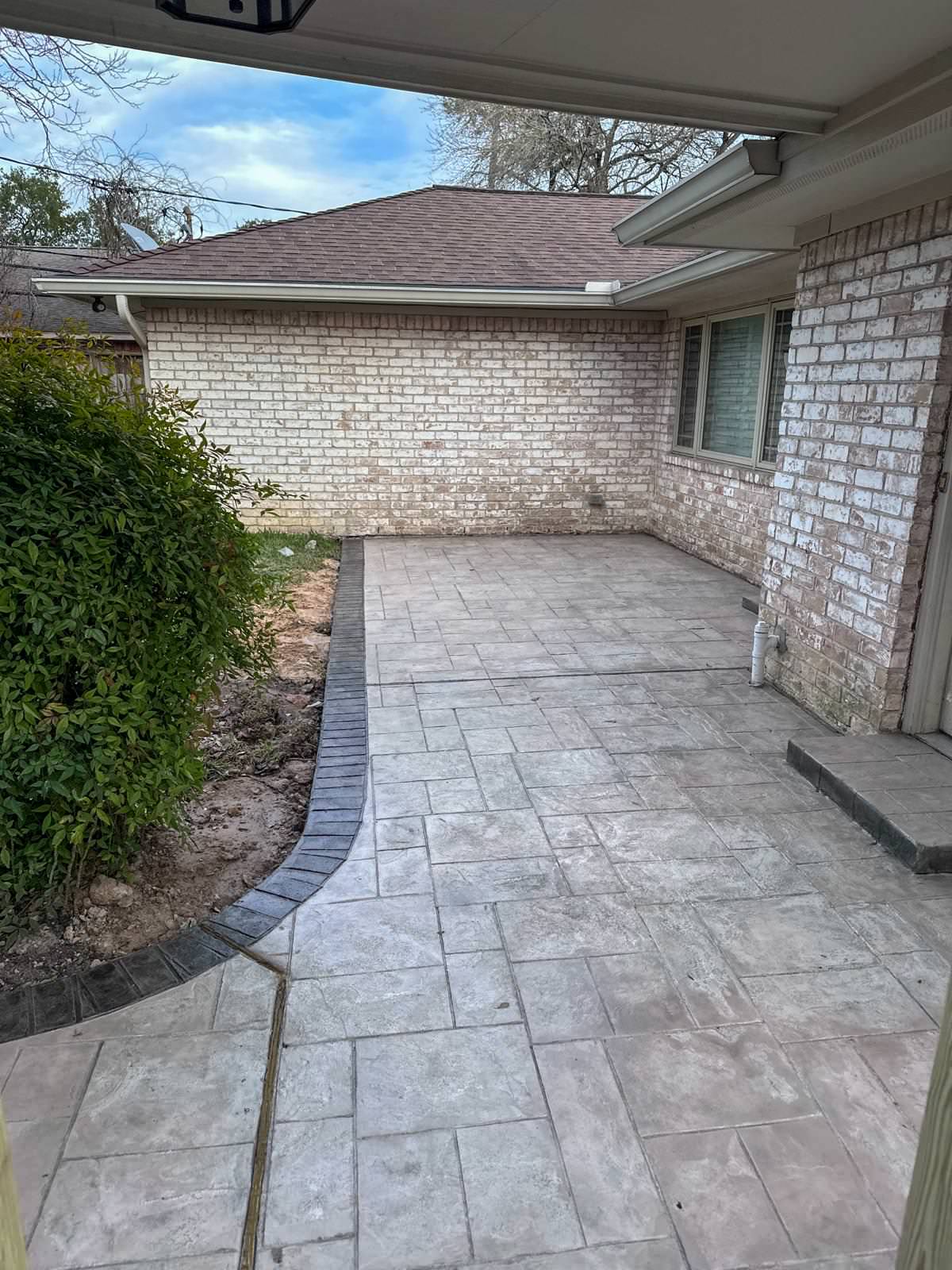 New driveway with sidewalks and stamped concrete!