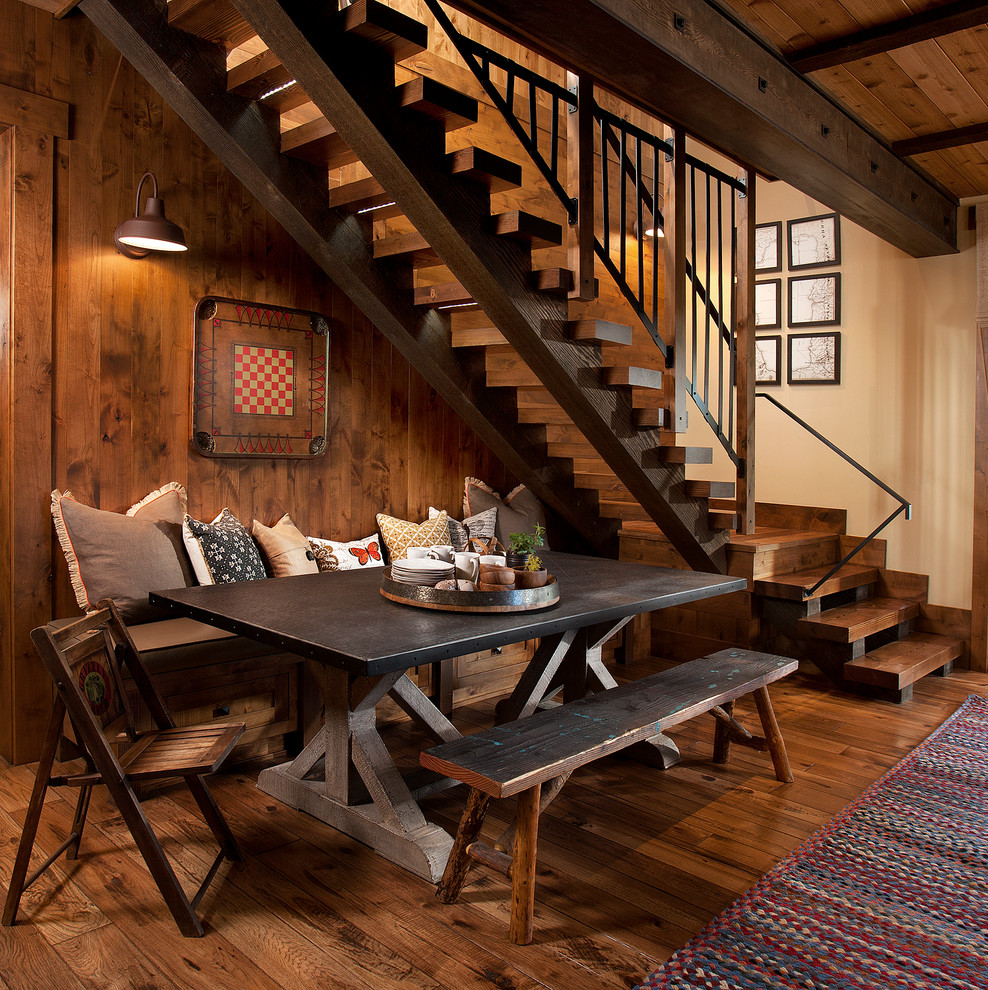 Inspiration for a country dining room in Sacramento with beige walls and dark hardwood floors.