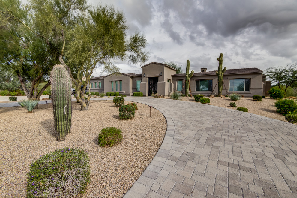 Example of a transitional exterior home design in Phoenix