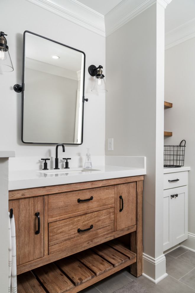 This is an example of a large beach style bathroom in Atlanta with grey walls, vinyl floors, beige floor, exposed beam and planked wall panelling.