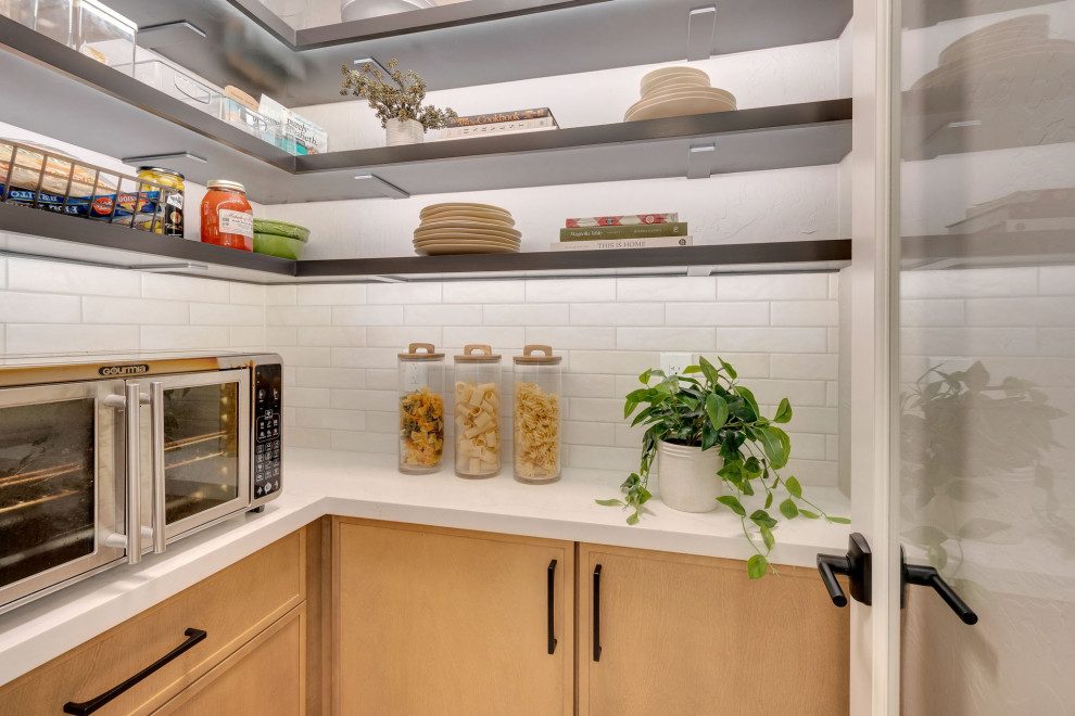Example of a transitional kitchen design in Phoenix