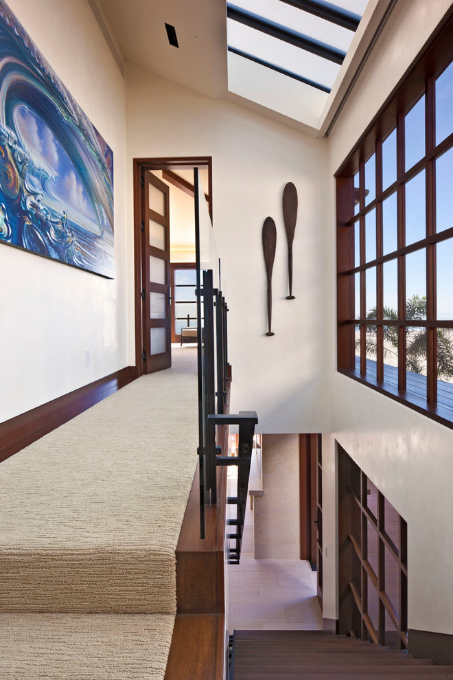 Inspiration for a contemporary hallway in Orange County with white walls.