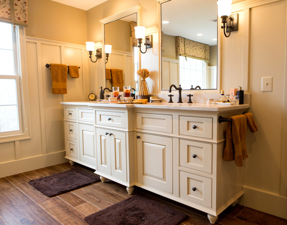 Design ideas for a large country master bathroom in DC Metro with an undermount sink, furniture-like cabinets, white cabinets, marble benchtops, a claw-foot tub, a corner shower, a two-piece toilet, brown tile, porcelain tile, multi-coloured walls and porcelain floors.