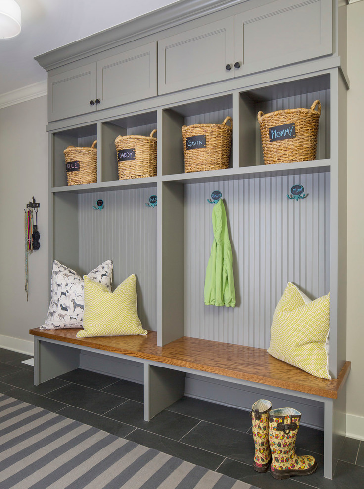 This is an example of a mudroom in Minneapolis with grey walls.