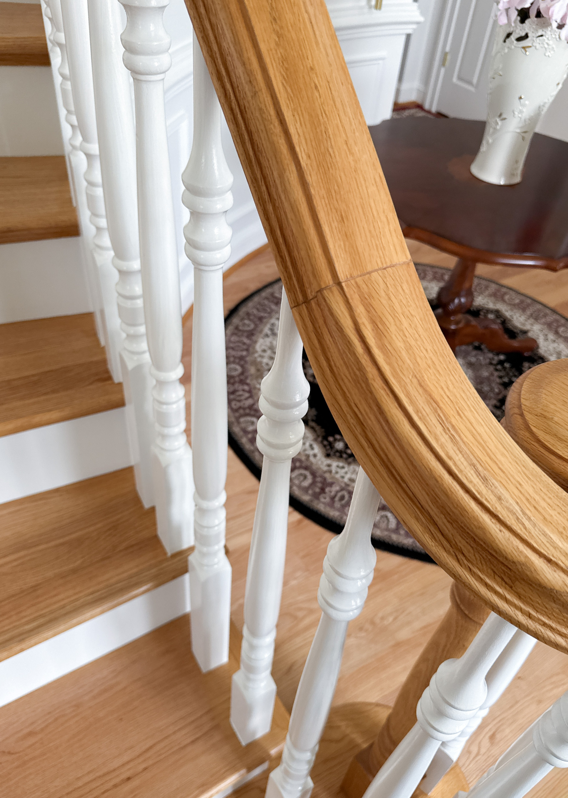 Project #161 | Curved Red Oak Foyer Staircase, 26 Years Later