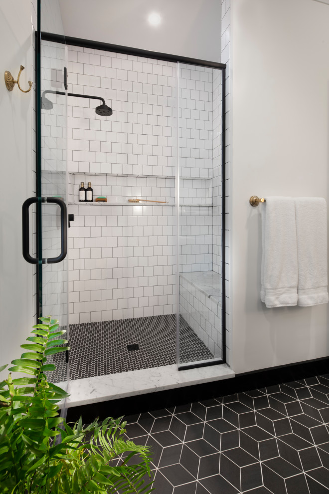 Inspiration for a medium sized bohemian shower room bathroom in DC Metro with open cabinets, white cabinets, an alcove shower, a one-piece toilet, white walls, marble flooring, a submerged sink, marble worktops, multi-coloured floors, a hinged door, white worktops, a wall niche and double sinks.