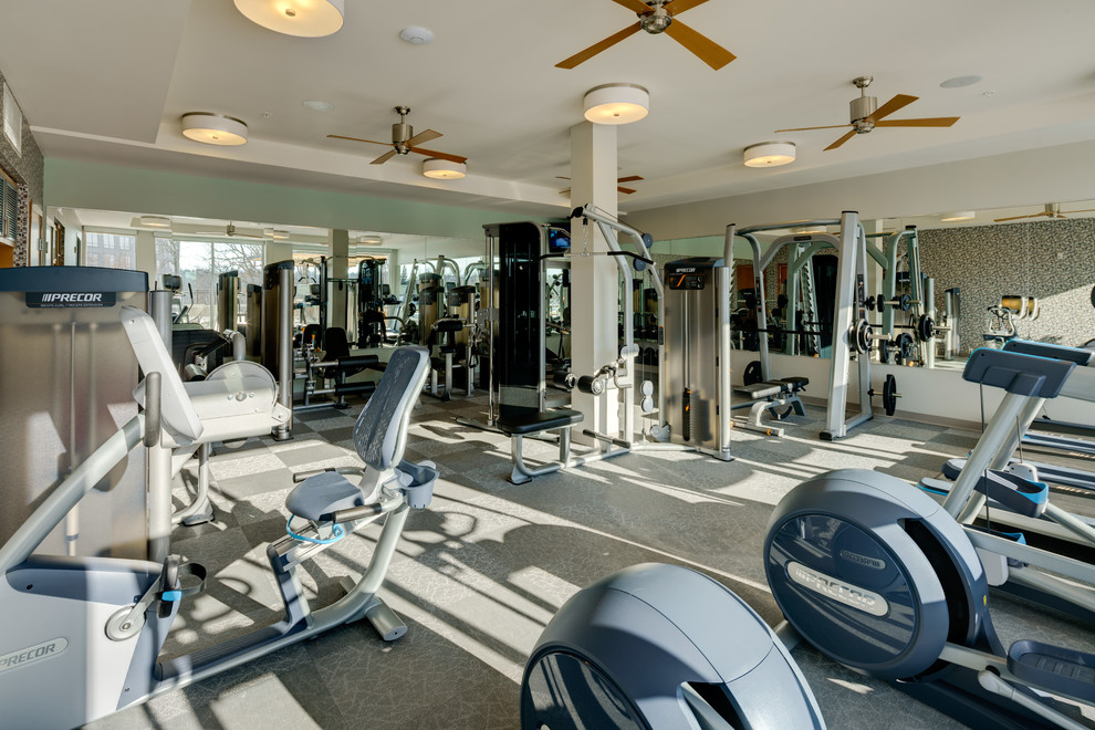Design ideas for a large modern multipurpose gym in Minneapolis with multi-coloured walls and vinyl floors.