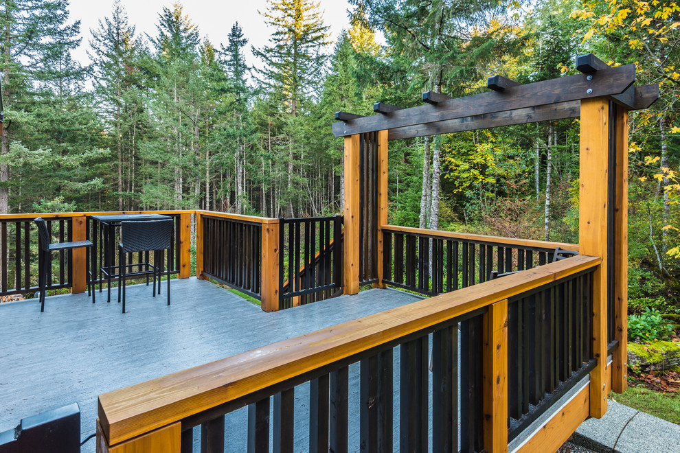 Deck - rustic deck idea in Vancouver