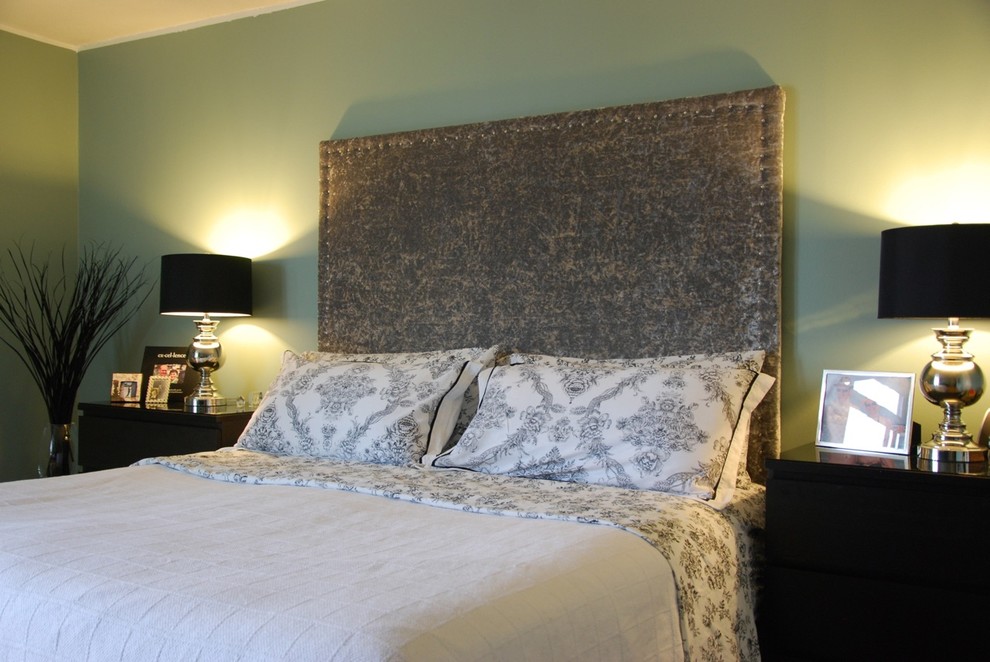 Large trendy light wood floor bedroom photo in Toronto with blue walls