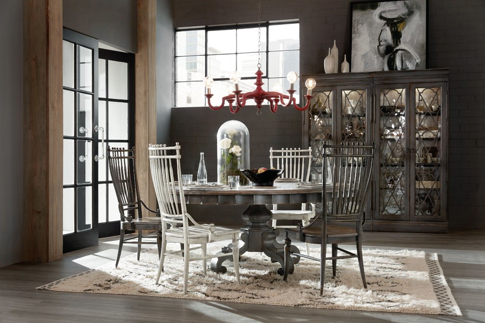 Inspiration for a mid-sized transitional porcelain tile and gray floor dining room remodel in Denver with gray walls and no fireplace