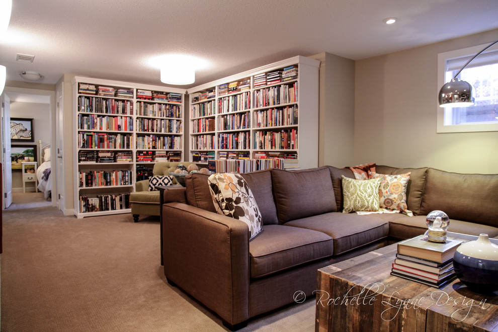 Inspiration for a mid-sized transitional look-out carpeted basement remodel in Calgary with gray walls and a standard fireplace