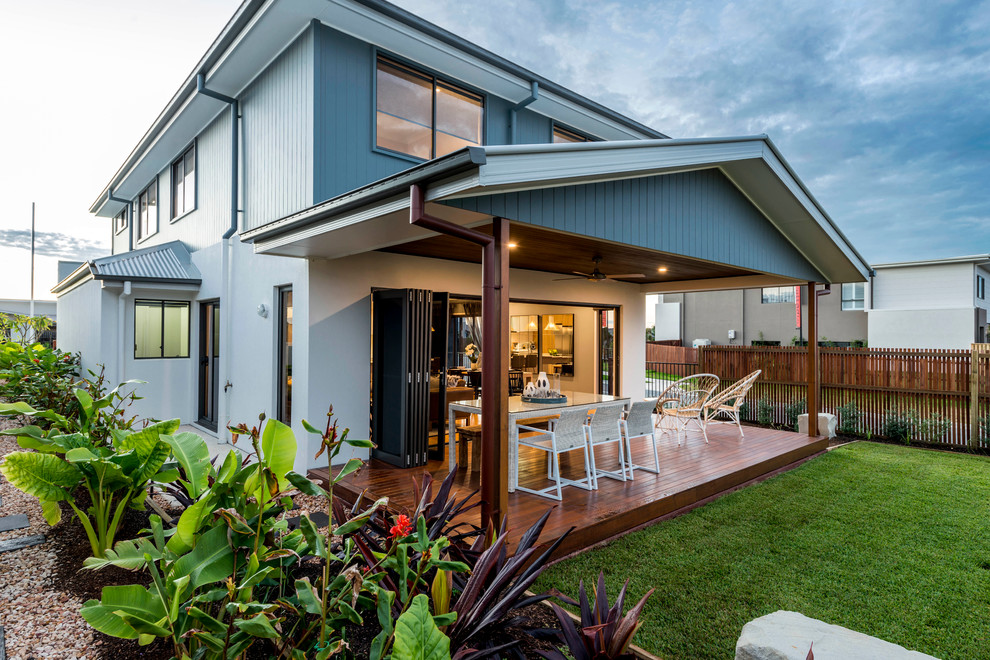 Mid-sized contemporary two-storey concrete white exterior in Brisbane with a hip roof.