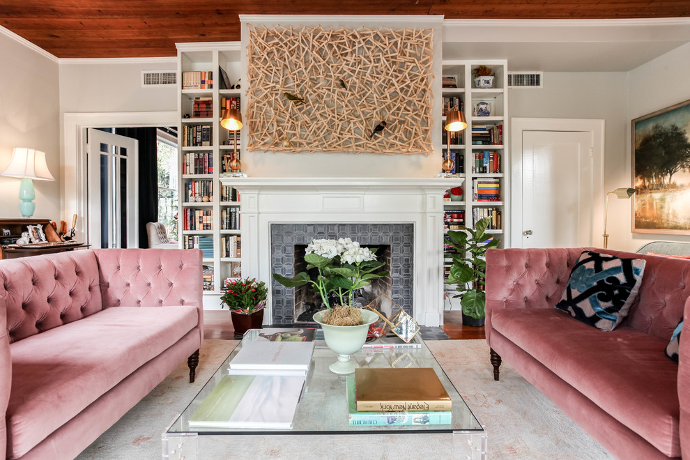Transitional formal living room in Austin with grey walls, a standard fireplace and a wood fireplace surround.