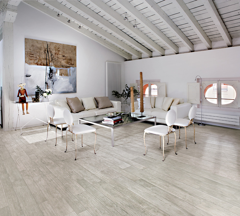 Photo of a scandinavian formal open concept living room in Seattle with white walls.