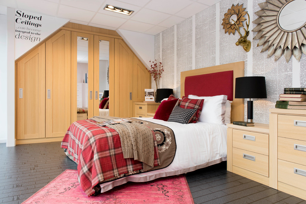 Large modern master bedroom in Essex with white walls.