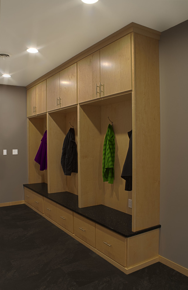 Inspiration for a mid-sized transitional mudroom remodel with gray walls