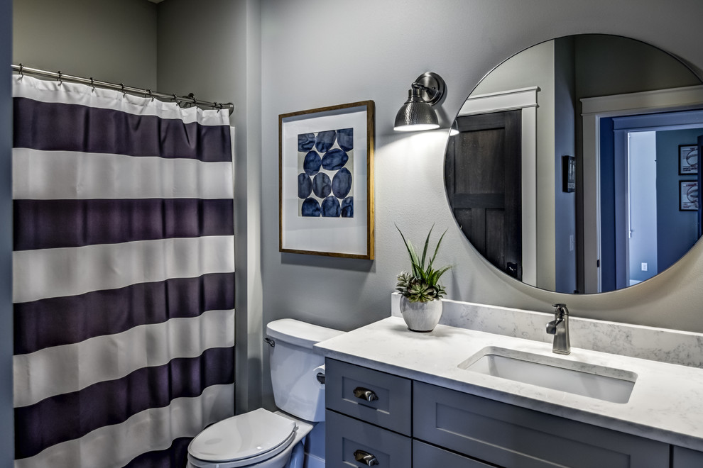 Arts and crafts kids' porcelain tile and gray floor bathroom photo in Other with shaker cabinets, gray cabinets, gray walls, an undermount sink and quartz countertops