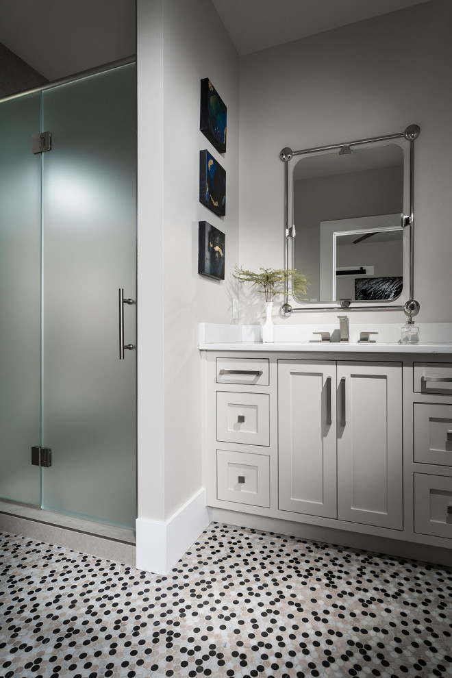 Inspiration for a mid-sized modern 3/4 bathroom in Other with grey cabinets, an alcove shower, a bidet, grey walls, porcelain floors, an undermount sink, engineered quartz benchtops, multi-coloured floor, a hinged shower door, white benchtops, a single vanity and a built-in vanity.