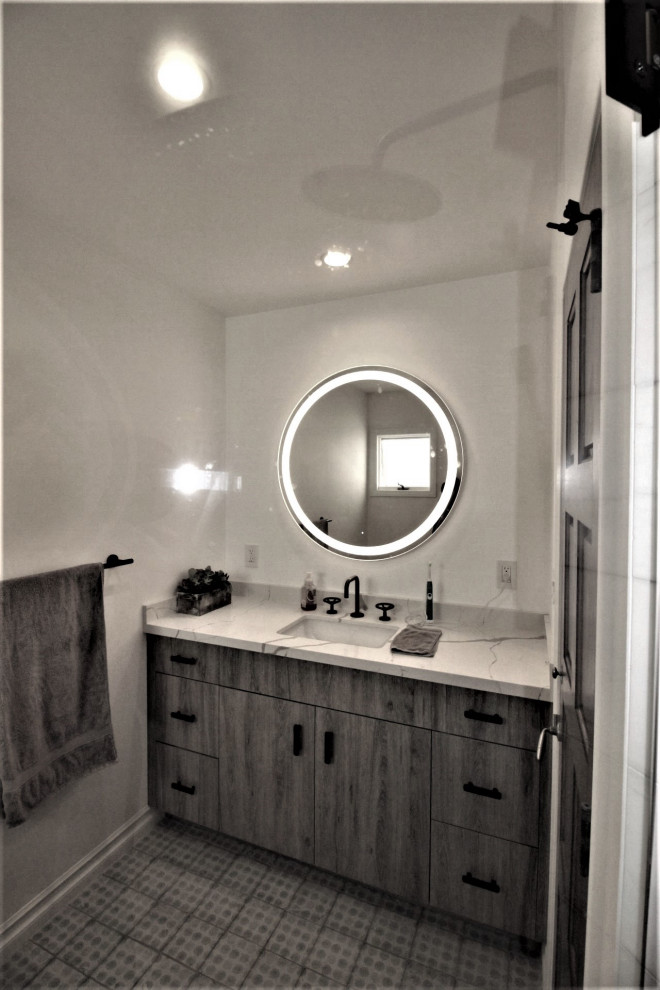 This is an example of a modern kids bathroom in Los Angeles with a built-in vanity.