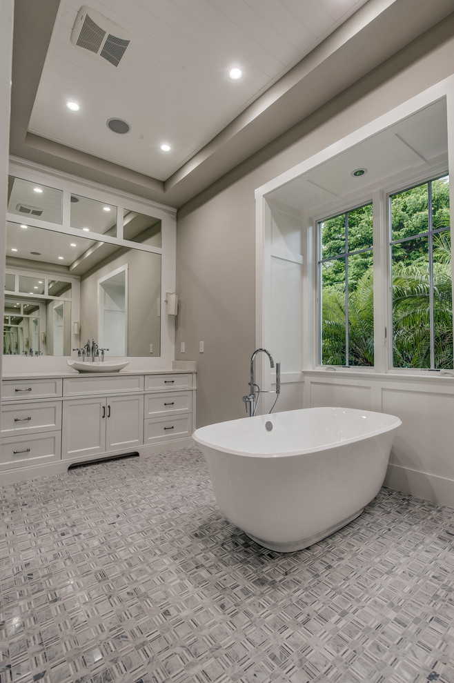 Design ideas for a mid-sized transitional master bathroom in Other with recessed-panel cabinets, white cabinets, a corner shower and grey walls.