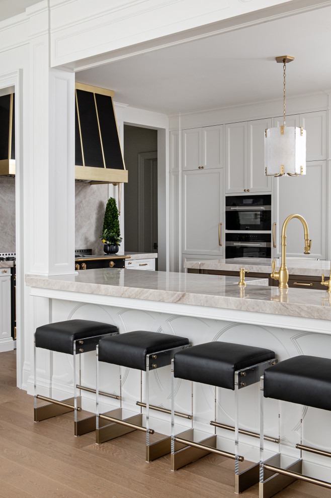 Open concept kitchen - large transitional u-shaped open concept kitchen idea in Toronto with an island