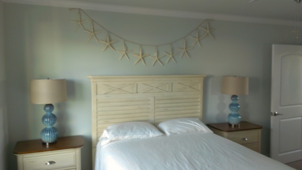 Design ideas for a beach style bedroom in Wilmington.