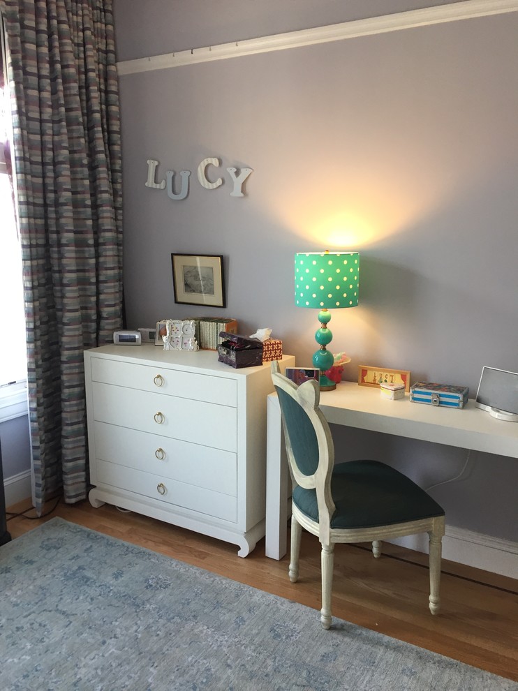 Inspiration for a mid-sized transitional kids' bedroom for girls and kids 4-10 years old in San Francisco with grey walls, medium hardwood floors and brown floor.