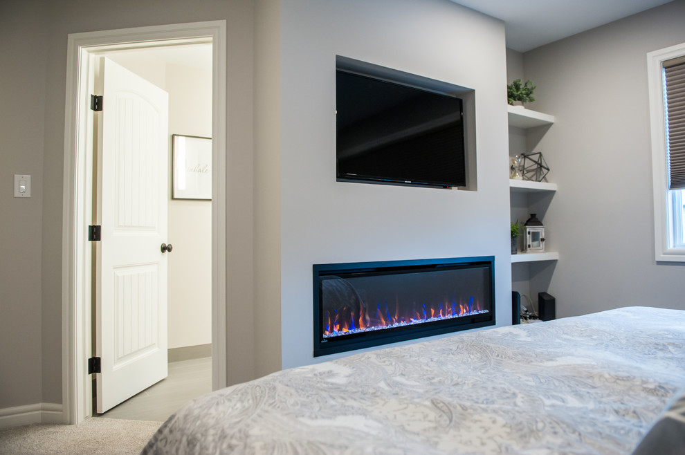 Example of a transitional home design design in Edmonton