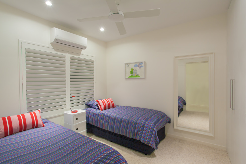 Photo of a contemporary guest bedroom in Sunshine Coast with white walls and carpet.