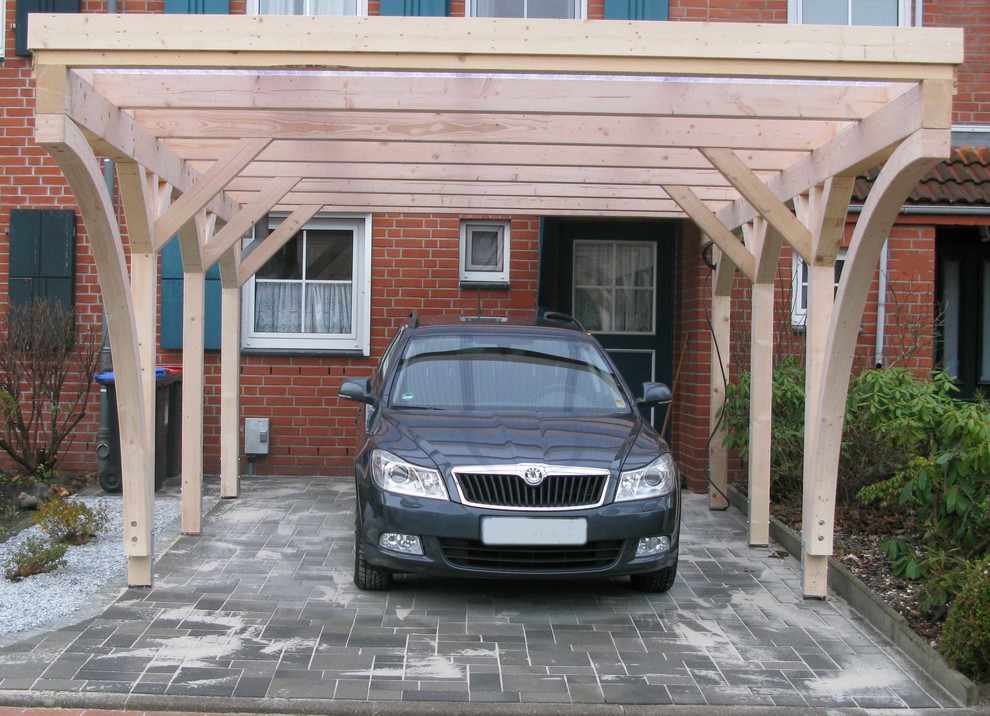 Mid-sized contemporary detached one-car carport in Hamburg.