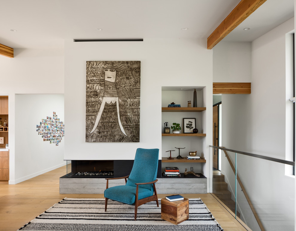 Midcentury living room in San Francisco with a plaster fireplace surround and vaulted.