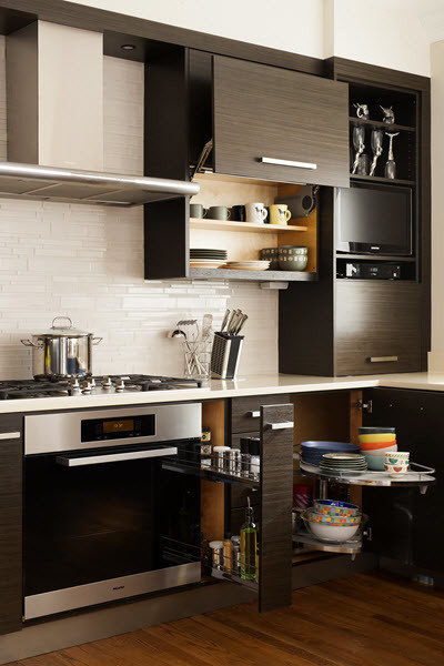Inspiration for a mid-sized transitional u-shaped medium tone wood floor and brown floor eat-in kitchen remodel in DC Metro with an undermount sink, flat-panel cabinets, white backsplash, stainless steel appliances, a peninsula, dark wood cabinets, quartz countertops and glass tile backsplash