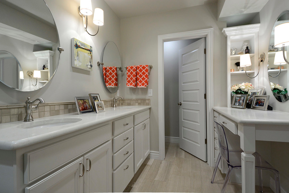 Inspiration for a mid-sized transitional master bathroom in Denver with an undermount sink, raised-panel cabinets, white cabinets, an alcove shower, a two-piece toilet, gray tile, mosaic tile, grey walls, porcelain floors and engineered quartz benchtops.
