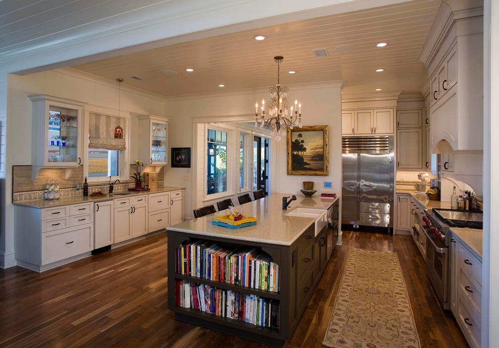 Design ideas for a traditional kitchen in Charleston with recessed-panel cabinets, stainless steel appliances, a double-bowl sink and white cabinets.