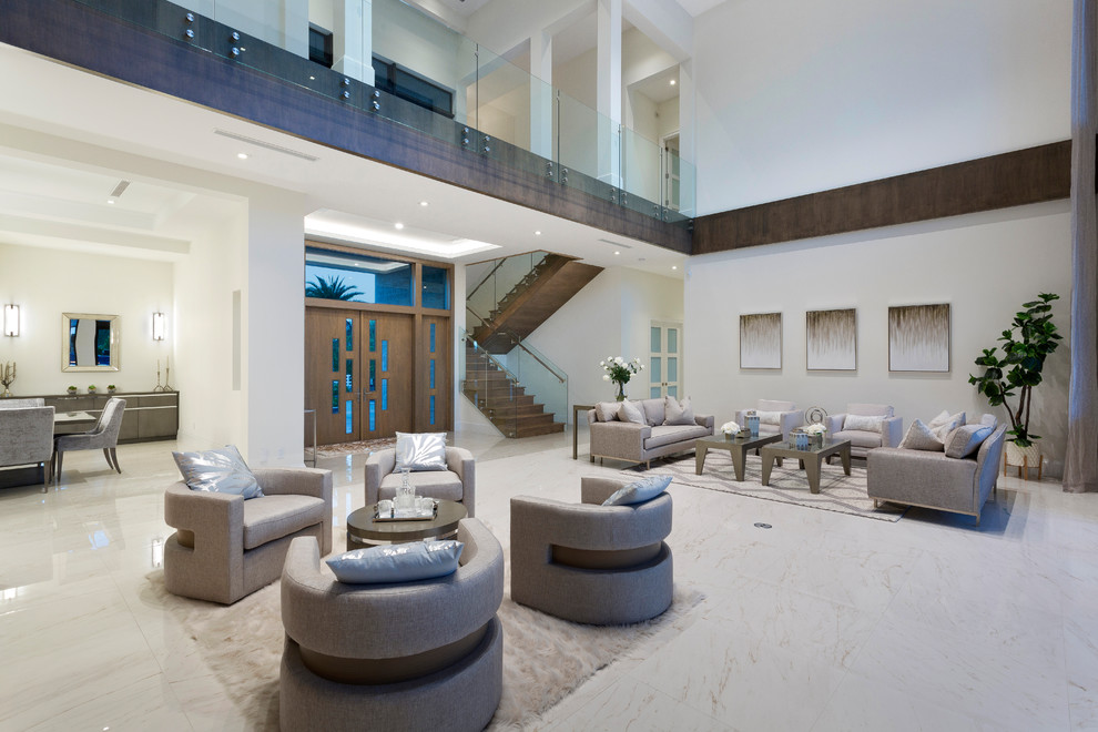 Inspiration for an expansive modern formal open concept living room in Miami with white walls, porcelain floors, a ribbon fireplace, a stone fireplace surround and white floor.