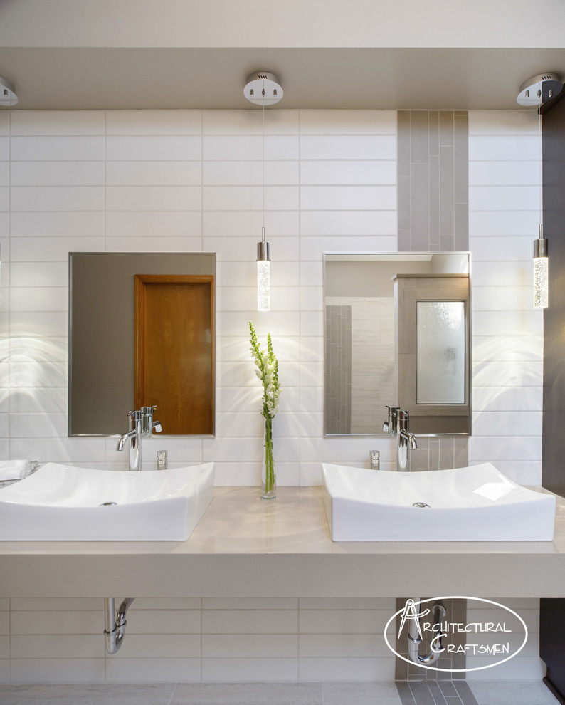 Modern master bathroom in Kansas City with a wall-mount sink, engineered quartz benchtops, an open shower, gray tile, porcelain tile, green walls and porcelain floors.
