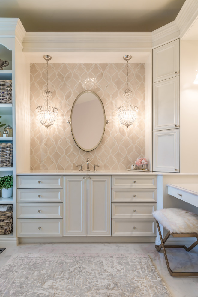 Design ideas for a large traditional master bathroom in Denver with recessed-panel cabinets, white cabinets, solid surface benchtops, white benchtops, a single vanity, a built-in vanity, beige tile and white floor.