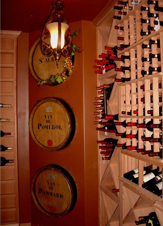 Photo of a mid-sized traditional wine cellar in Orange County with display racks.