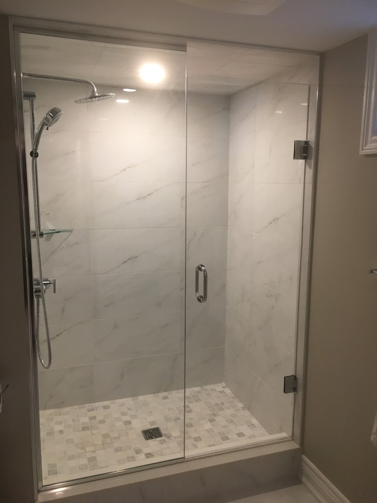 Inspiration for a mid-sized modern 3/4 bathroom in Toronto with flat-panel cabinets, white cabinets, an alcove shower, a one-piece toilet, white tile, marble, beige walls, marble floors, an integrated sink, engineered quartz benchtops, white floor and a shower curtain.