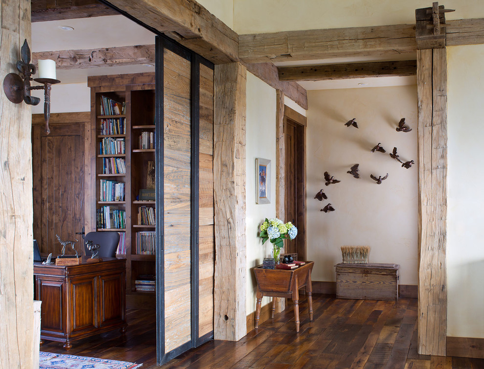 Inspiration for a rustic hallway remodel in Denver