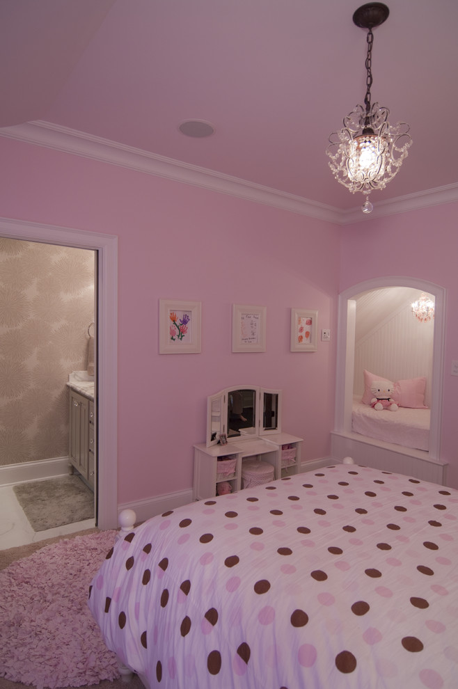 Design ideas for a mid-sized traditional kids' bedroom for kids 4-10 years old and girls in Charlotte with pink walls and carpet.