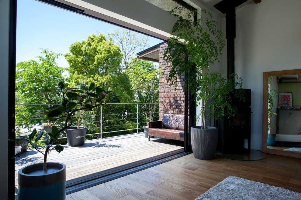 Inspiration for a large urban terrace in Other with a roof extension.