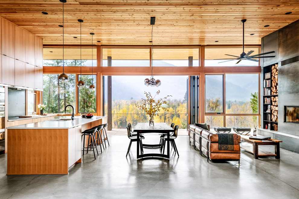 Country living room in Seattle with wood and wood walls.